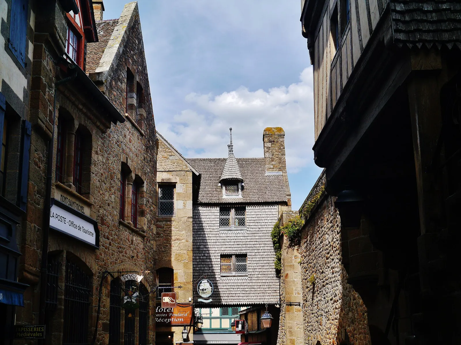 Crowded Grande Rue leading up toward Mont Saint-Michel Abbey